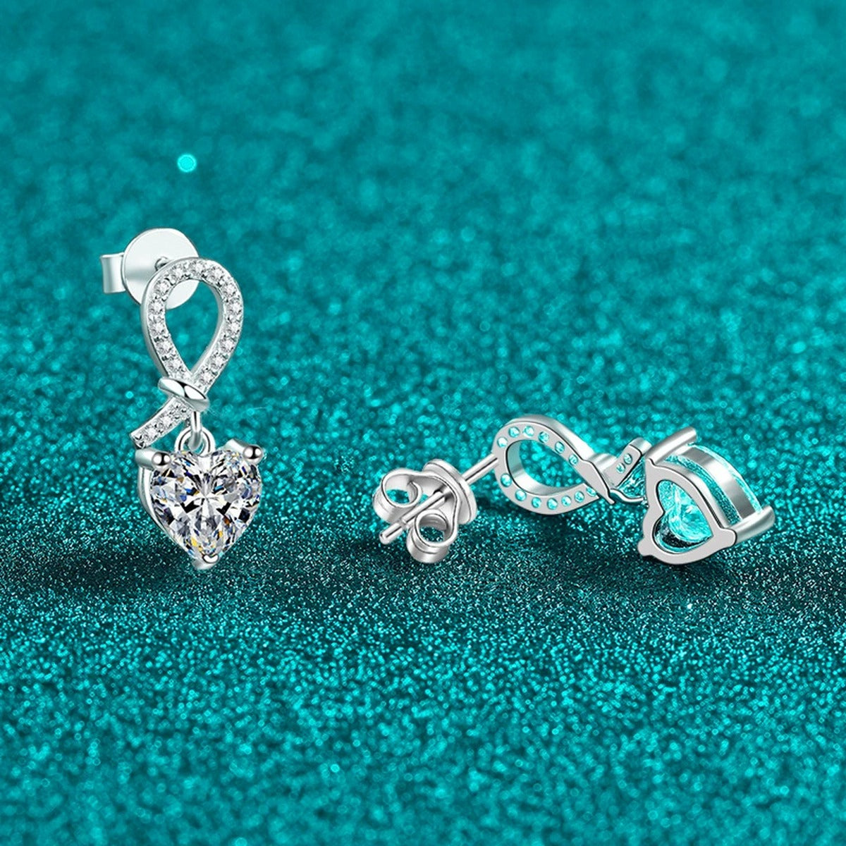 Heart Moissanite Stud Dangle Earrings with CZ in Rhodium-Plated S925 sterling silver product scene view showing angled setting detail