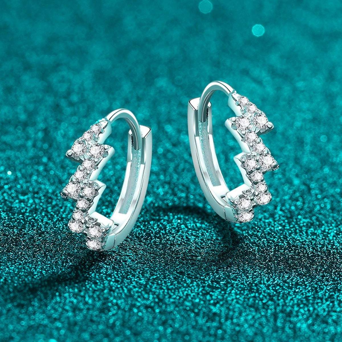 Wave Moissanite Huggie Hoop Earrings in Rhodium-Plated S925 sterling silver product scene view showing front sparkle