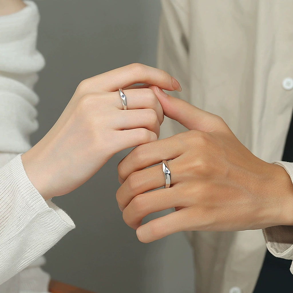 Moissanite Couples Wedding Band Set worn on hand to show scale, band width, and ring profile