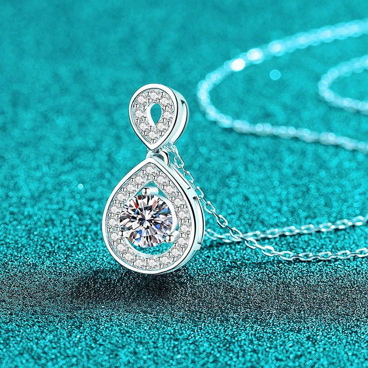 Teardrop Halo Moissanite Pendant Necklace with CZ in Rhodium-Plated S925 sterling silver close-up product scene showing pendant setting