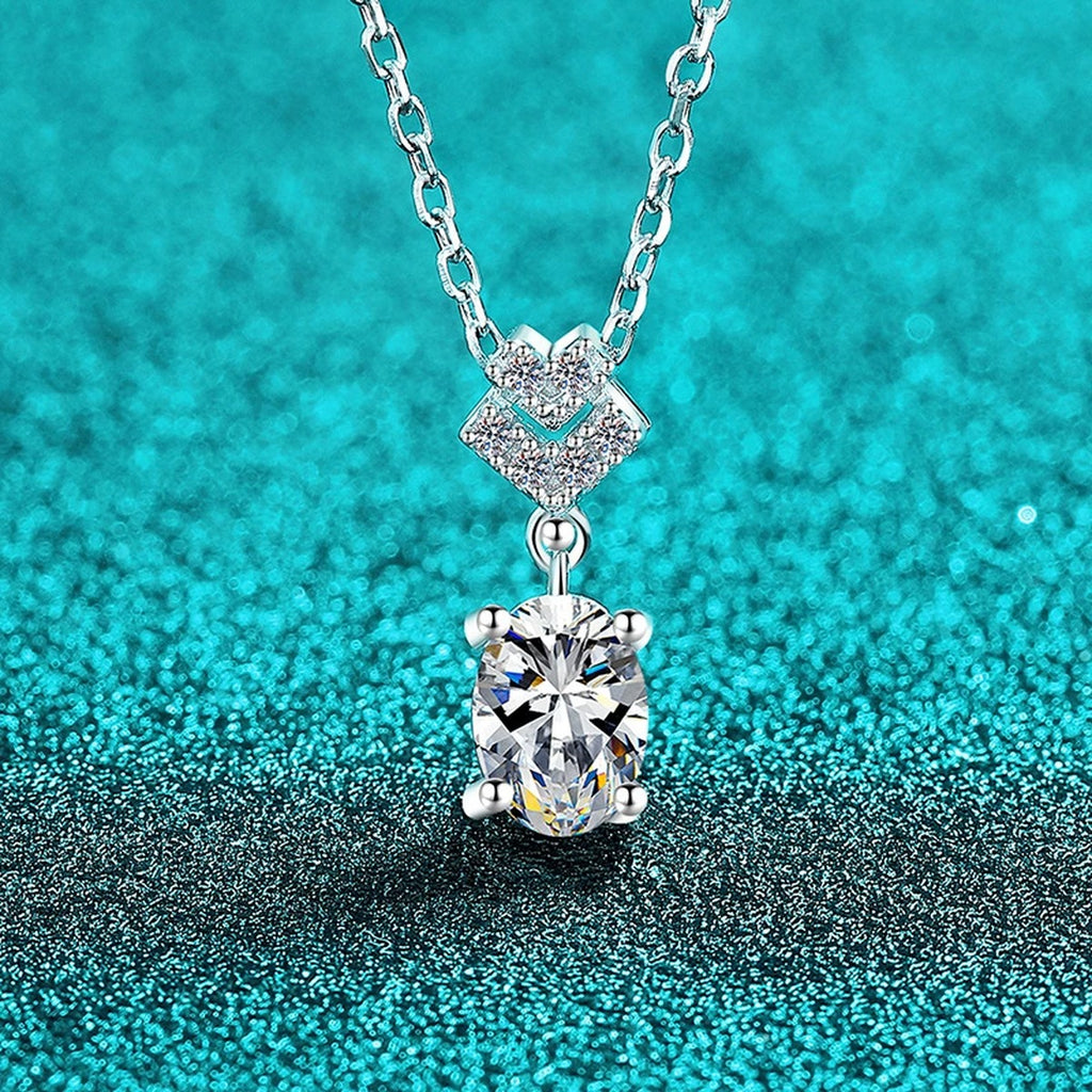 Bow Oval Moissanite Pendant Necklace in Rhodium-Plated S925 sterling silver blue display scene showing chain and stone layout