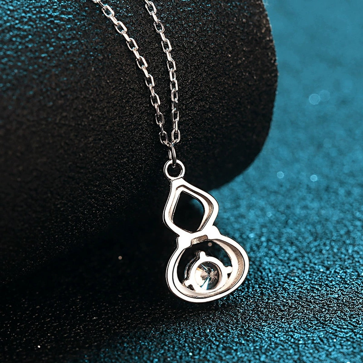 Gourd Moissanite Pendant Necklace with CZ in Rhodium-Plated S925 sterling silver product scene view showing chain and setting detail