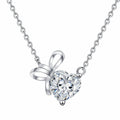 Bow Heart Moissanite Pendant Necklace in Rhodium-Plated S925 sterling silver white background product photo showing heart cut moissanite pendant with a small bow accent
