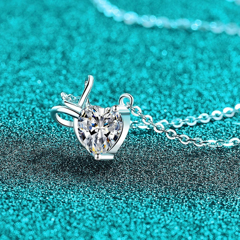 Bow Heart Moissanite Pendant Necklace in Rhodium-Plated S925 sterling silver angled product detail view