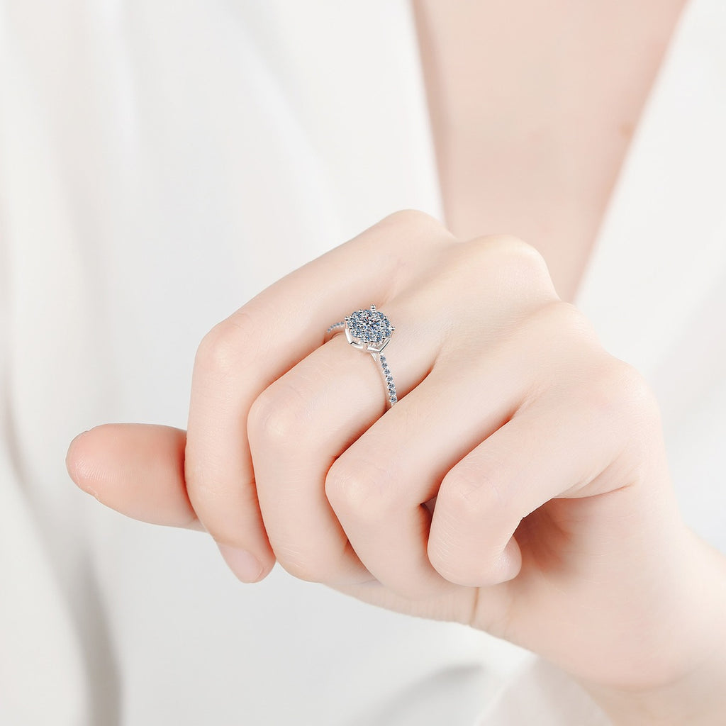 Round Cluster Halo Moissanite Engagement Ring with CZ worn on hand to show scale, band width, and ring profile
