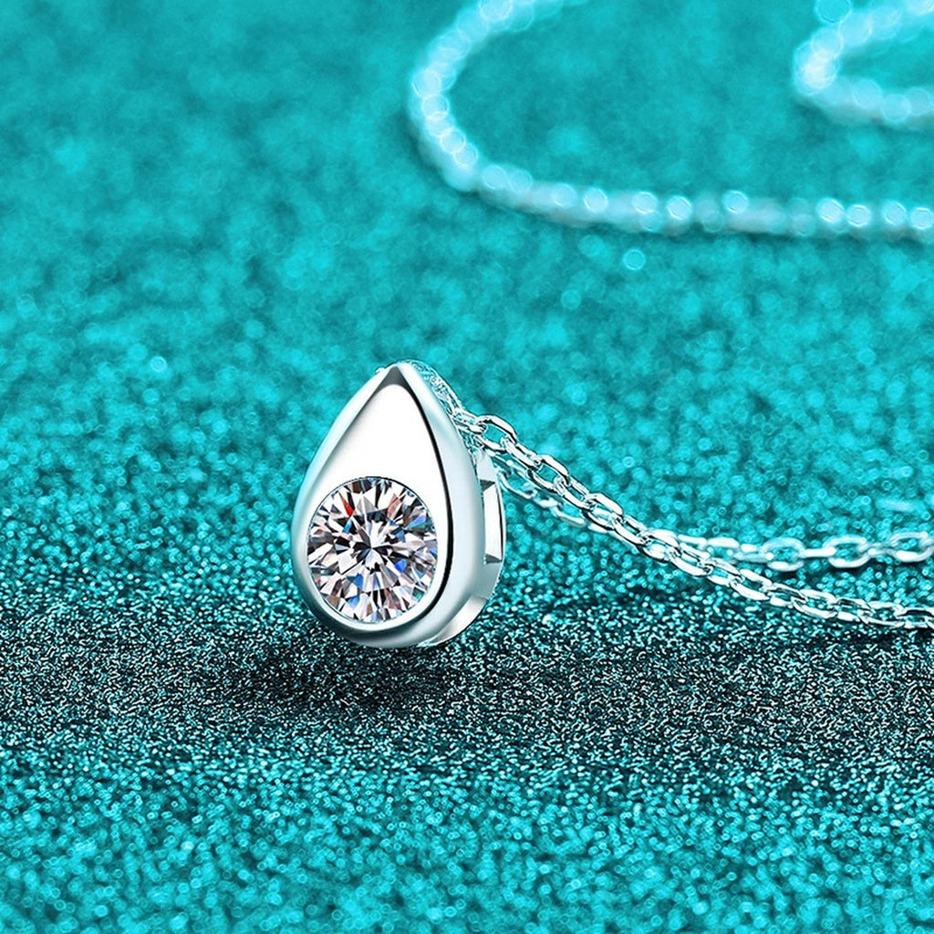 Teardrop Round Moissanite Pendant Necklace in Rhodium-Plated S925 sterling silver close-up product scene showing pendant setting