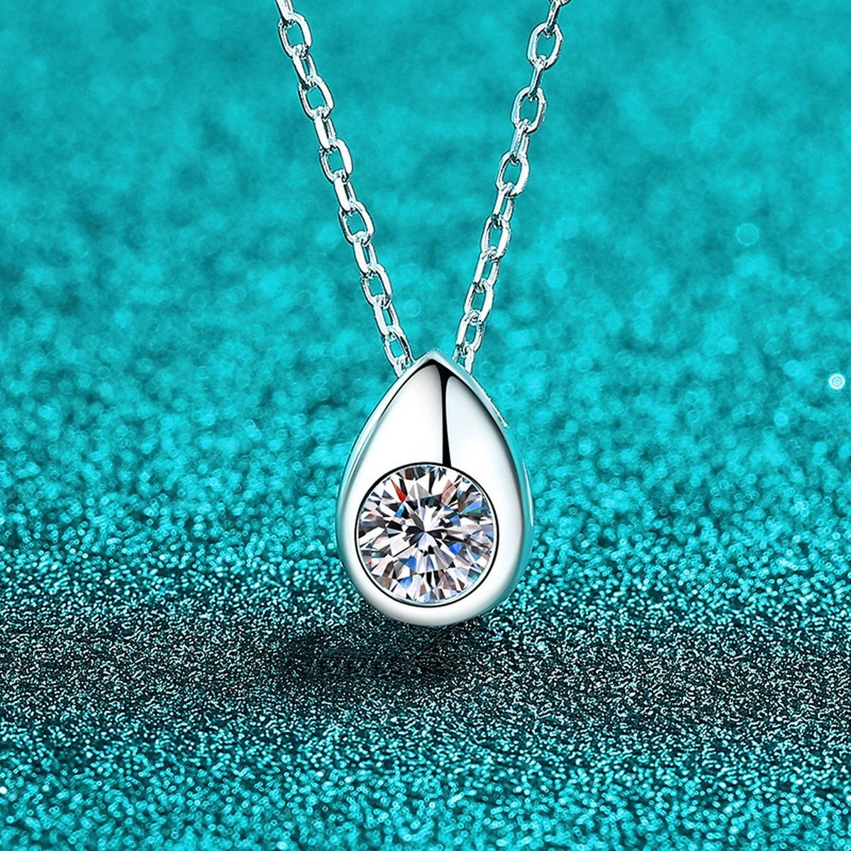 Teardrop Round Moissanite Pendant Necklace in Rhodium-Plated S925 sterling silver angled product detail view