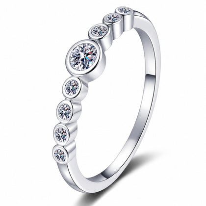 Round Moissanite Stackable Band Ring in rhodium-plated S925 sterling silver on clean white background