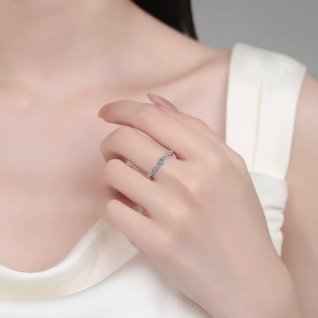 Round Moissanite Stackable Band Ring worn on hand to show scale, band width, and ring profile