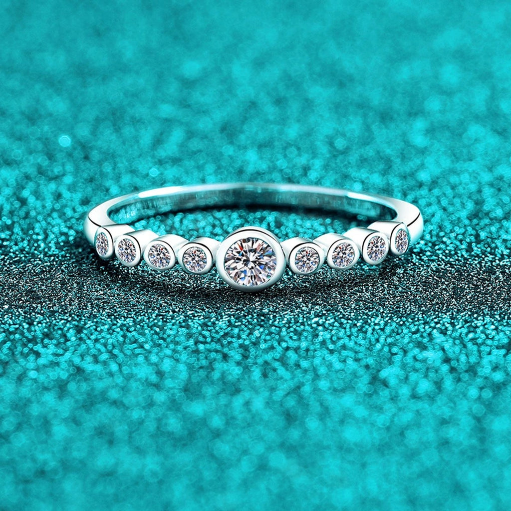 Round Moissanite Stackable Band Ring product view showing moissanite setting and metal finish