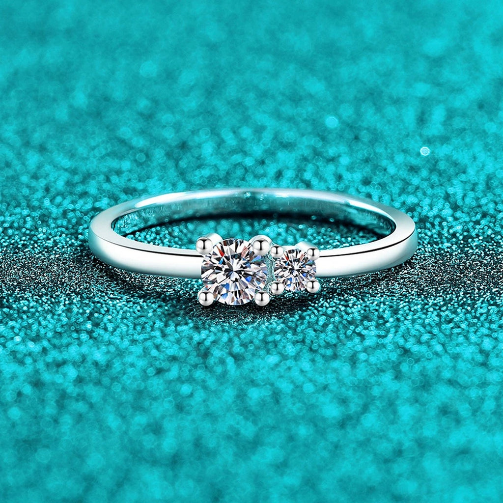 Round Moissanite Three Stone Ring product view showing moissanite setting and metal finish