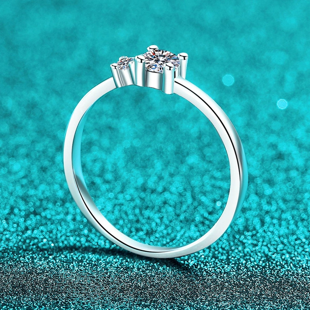 Round Moissanite Three Stone Ring product view showing moissanite setting and metal finish