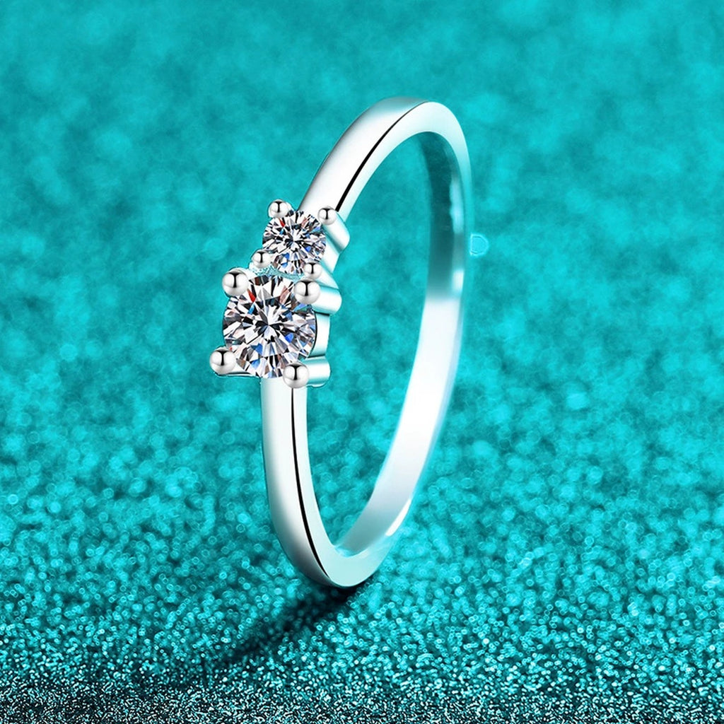 Round Moissanite Three Stone Ring product view showing moissanite setting and metal finish