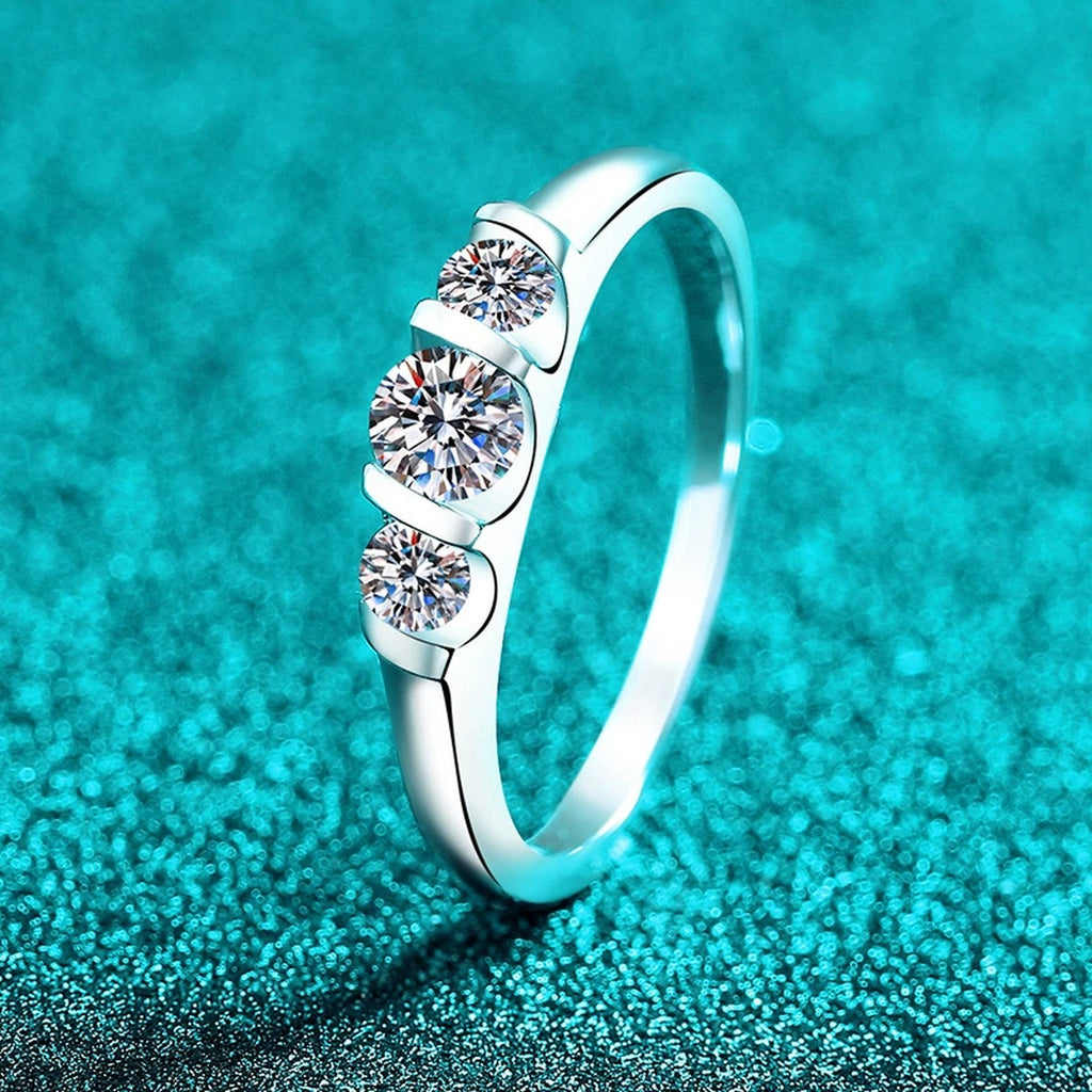 Round Moissanite Five Stone Ring product view showing moissanite setting and metal finish