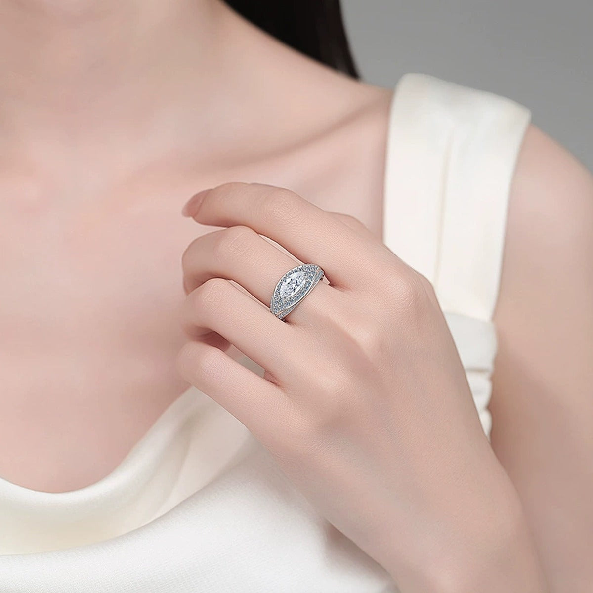 Marquise Moissanite Statement Ring with CZ worn on hand to show scale, band width, and ring profile
