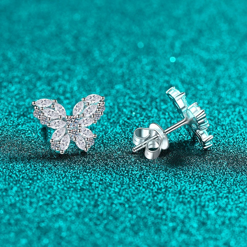 Butterfly Moissanite Stud Earrings in Rhodium-Plated S925 sterling silver product scene view showing front sparkle