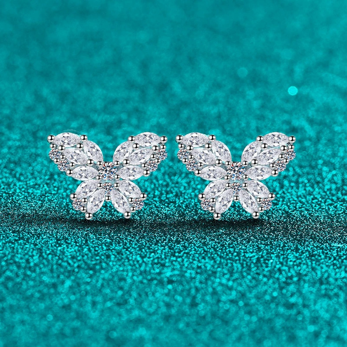 Butterfly Moissanite Stud Earrings in Rhodium-Plated S925 sterling silver product scene view showing angled setting detail