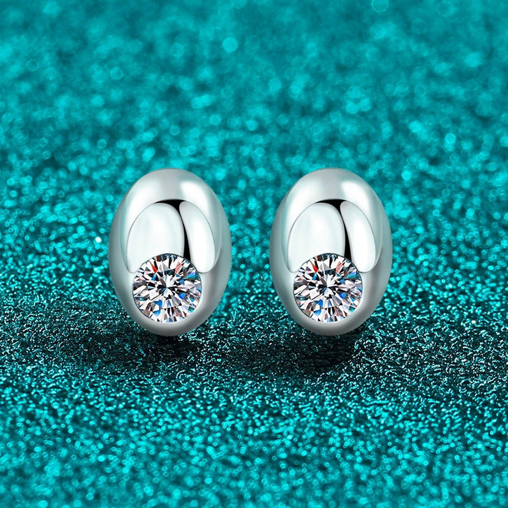 Round Moissanite Oval Stud Earrings in Rhodium-Plated S925 sterling silver product scene view showing front sparkle