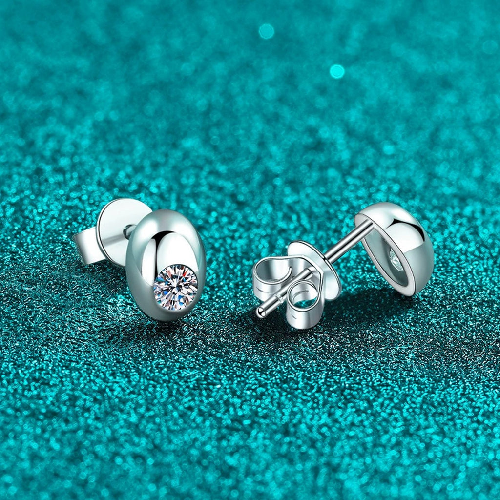 Round Moissanite Oval Stud Earrings in Rhodium-Plated S925 sterling silver product scene view showing angled setting detail