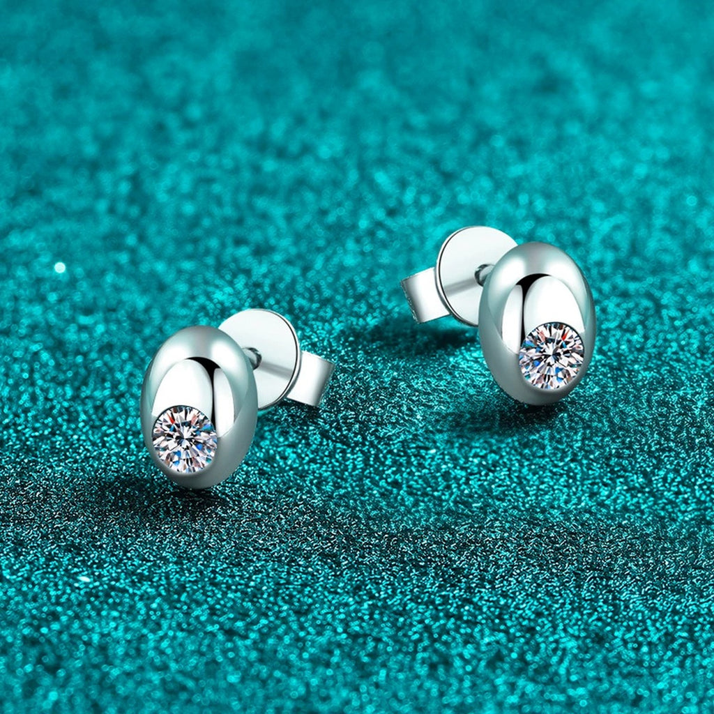 Round Moissanite Oval Stud Earrings in Rhodium-Plated S925 sterling silver product scene view showing side profile