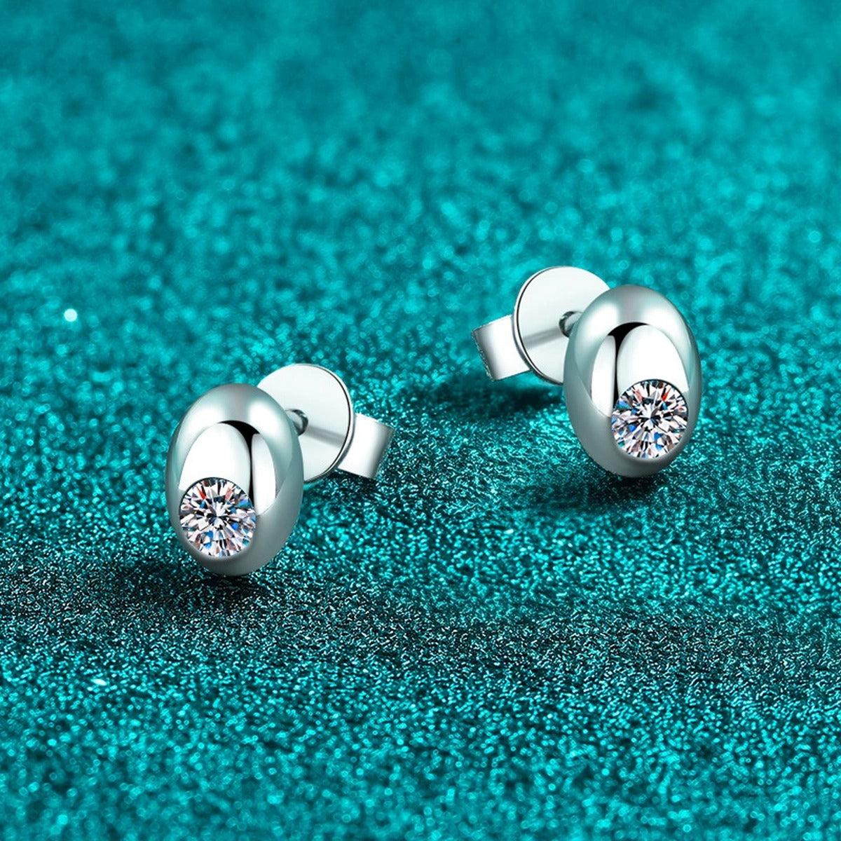 Round Moissanite Oval Stud Earrings in Rhodium-Plated S925 sterling silver product scene view showing side profile