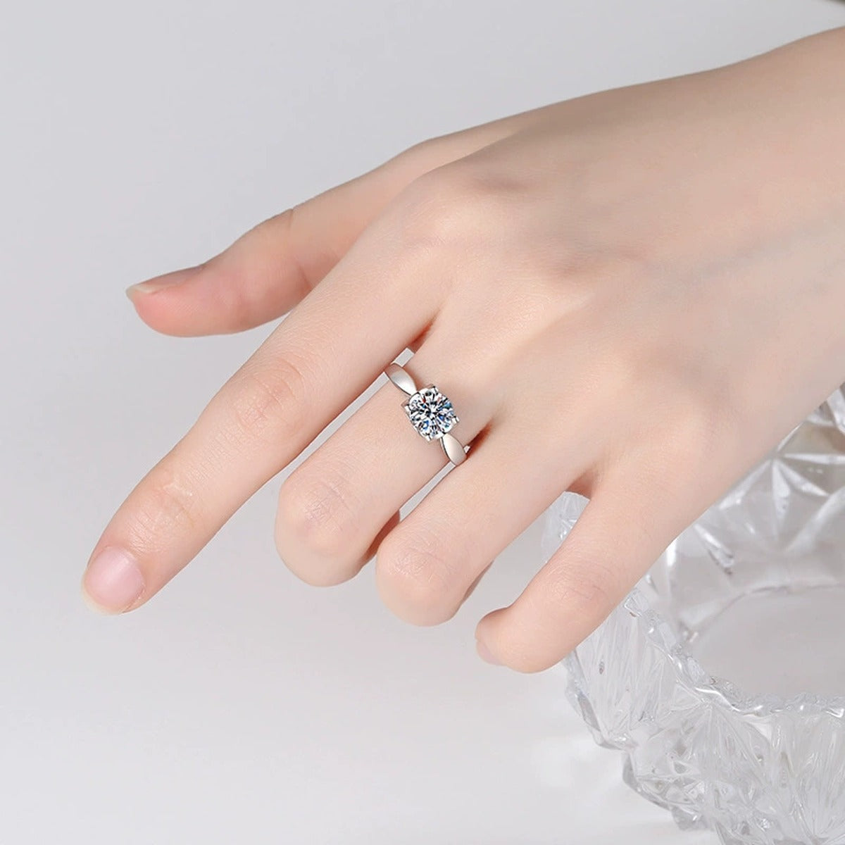 Round Moissanite Adjustable Solitaire Ring worn on hand to show scale, band width, and ring profile