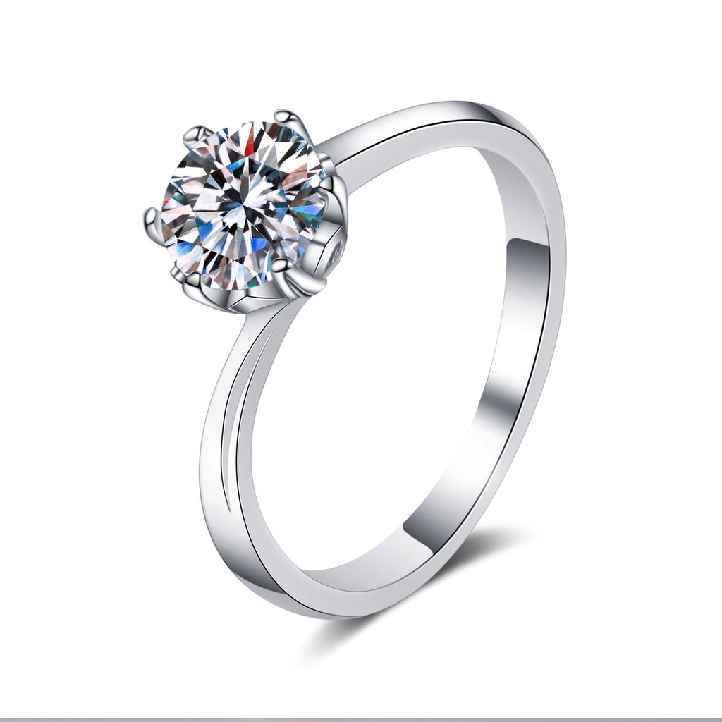 Round Moissanite Solitaire Engagement Ring in rhodium-plated S925 sterling silver on clean white background