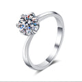 Round Moissanite Solitaire Engagement Ring in rhodium-plated S925 sterling silver on clean white background