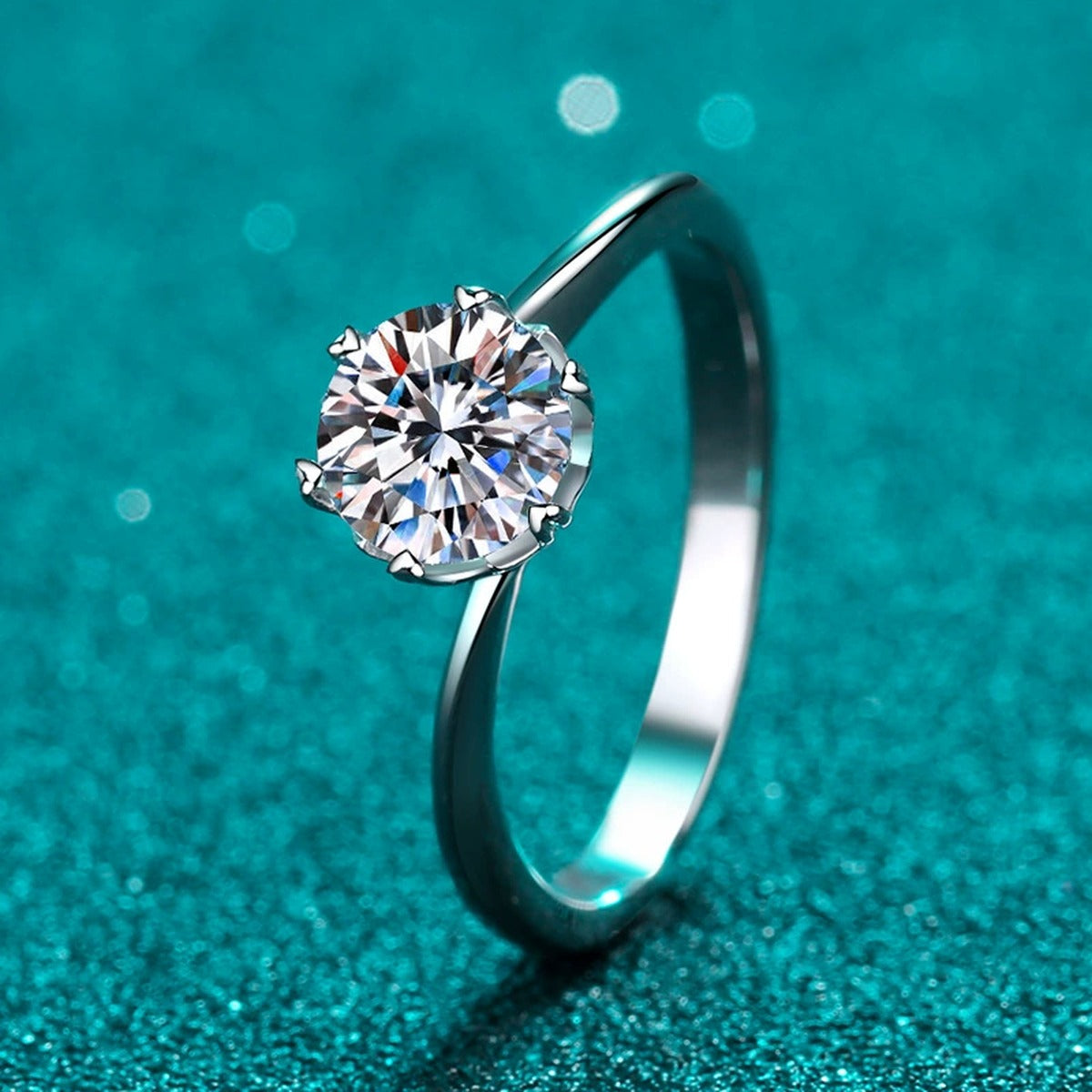 Round Moissanite Solitaire Engagement Ring product view showing moissanite setting and metal finish