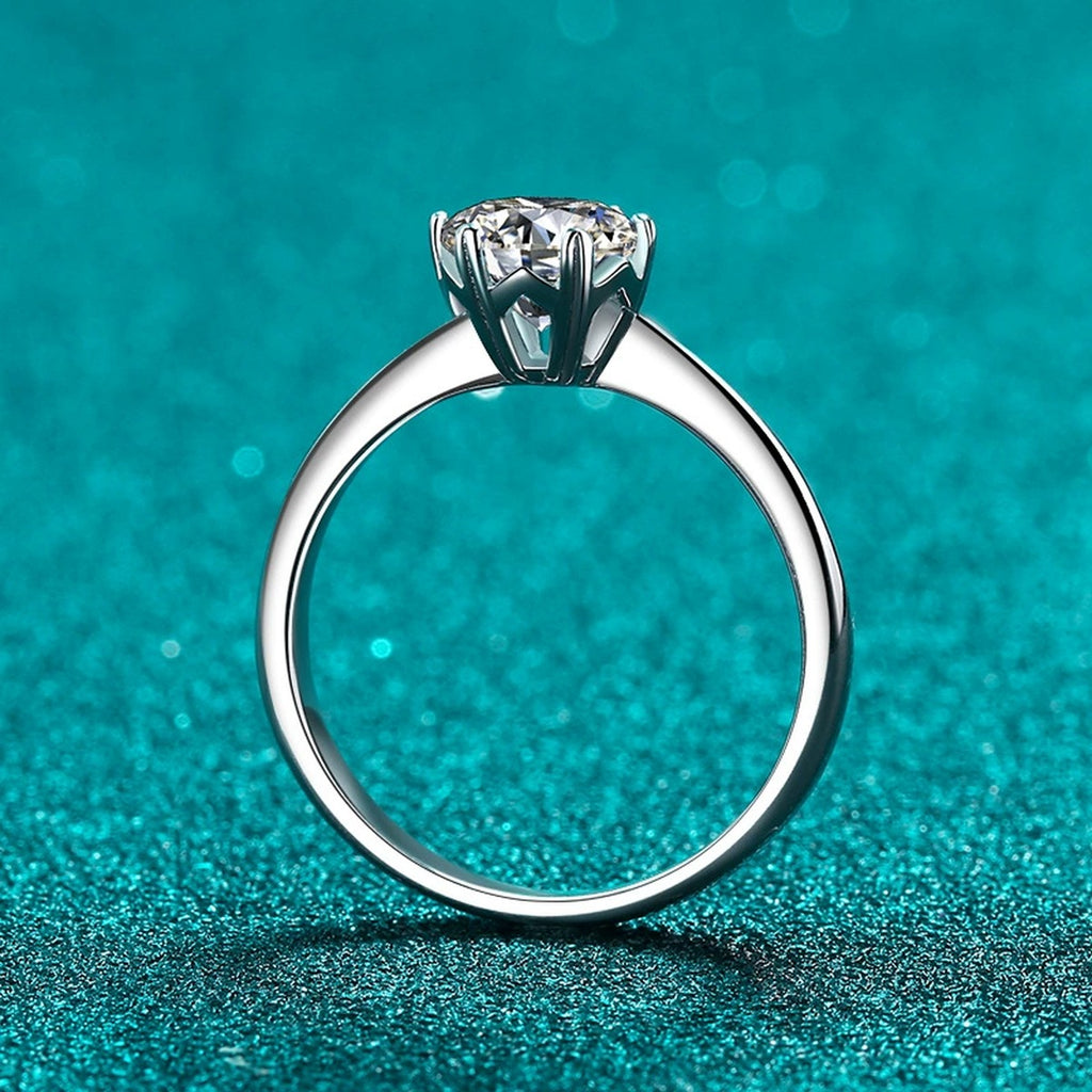 Round Moissanite Solitaire Engagement Ring product view showing moissanite setting and metal finish