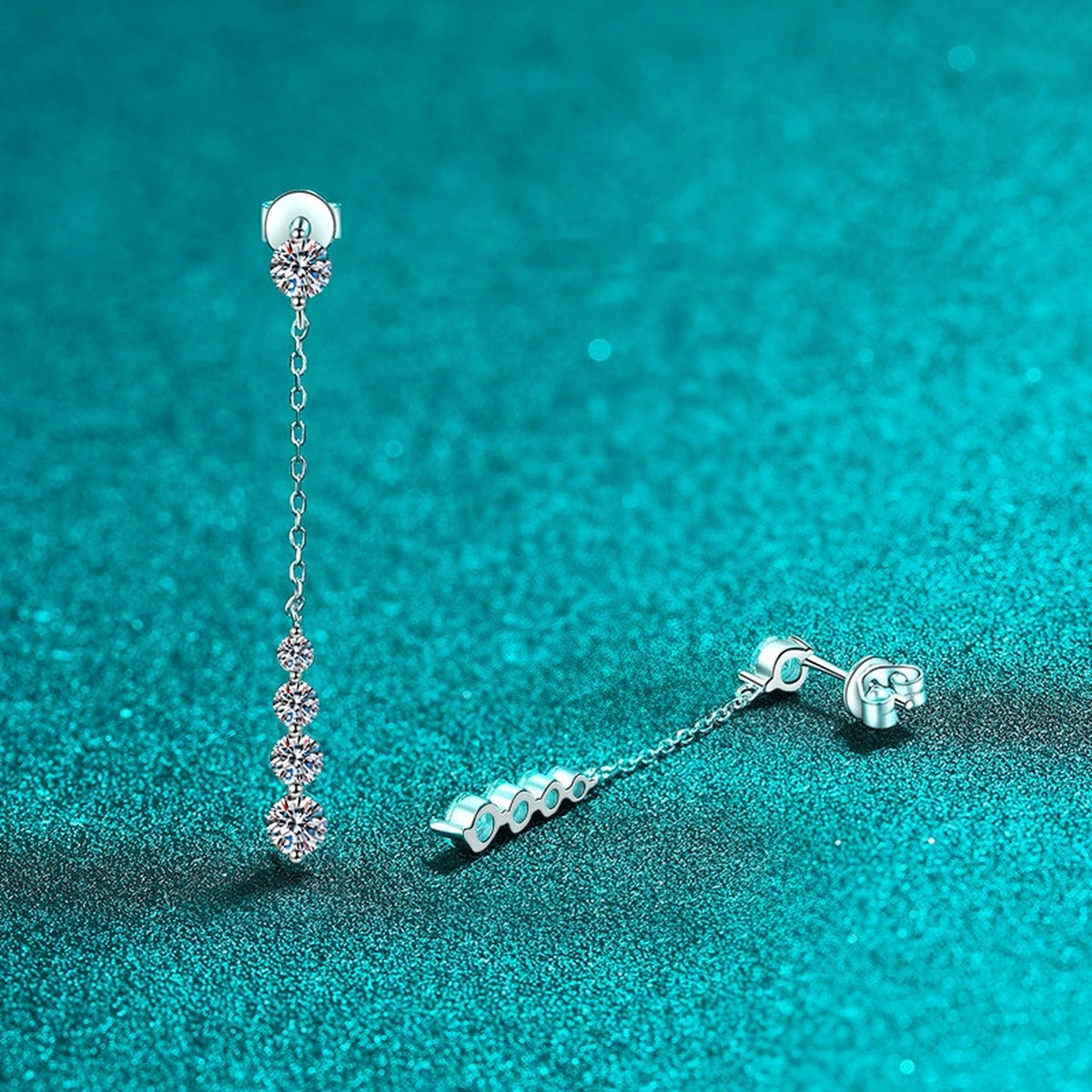 Graduated Moissanite Chain Stud Dangle Earrings in Rhodium-Plated S925 sterling silver product scene view showing angled setting detail