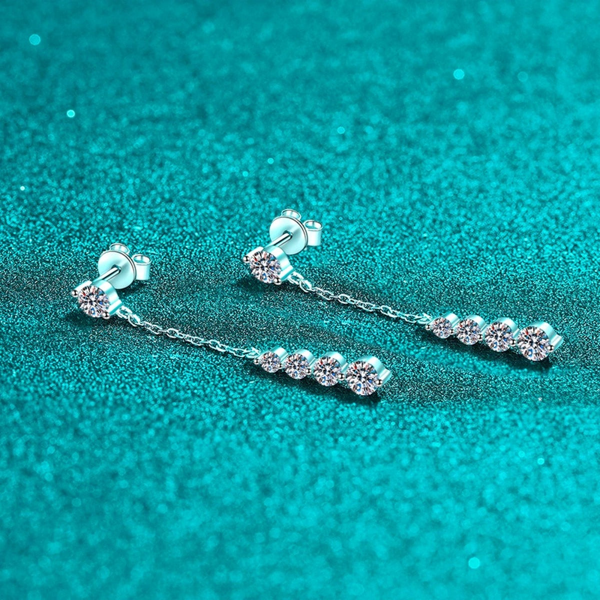 Graduated Moissanite Chain Stud Dangle Earrings in Rhodium-Plated S925 sterling silver product scene view showing side profile