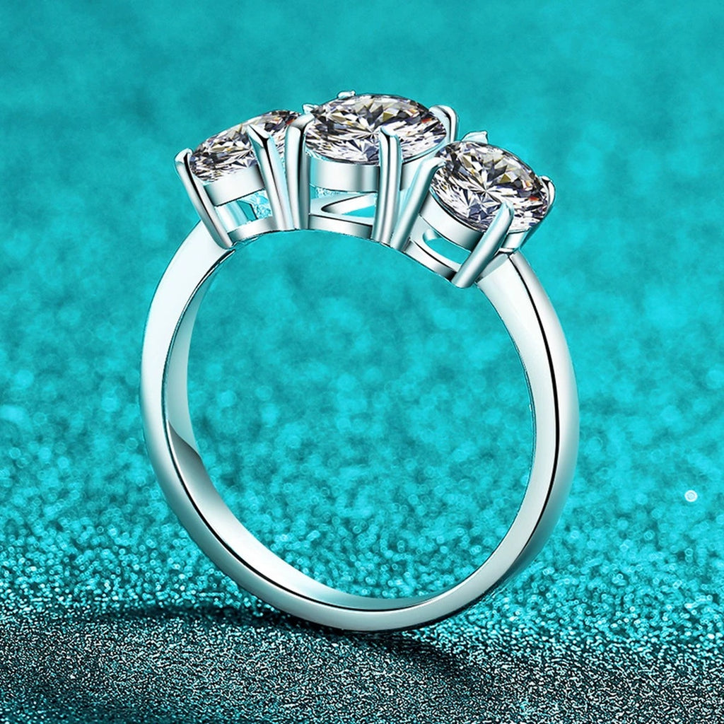 Oval Moissanite Three Stone Ring product view showing moissanite setting and metal finish