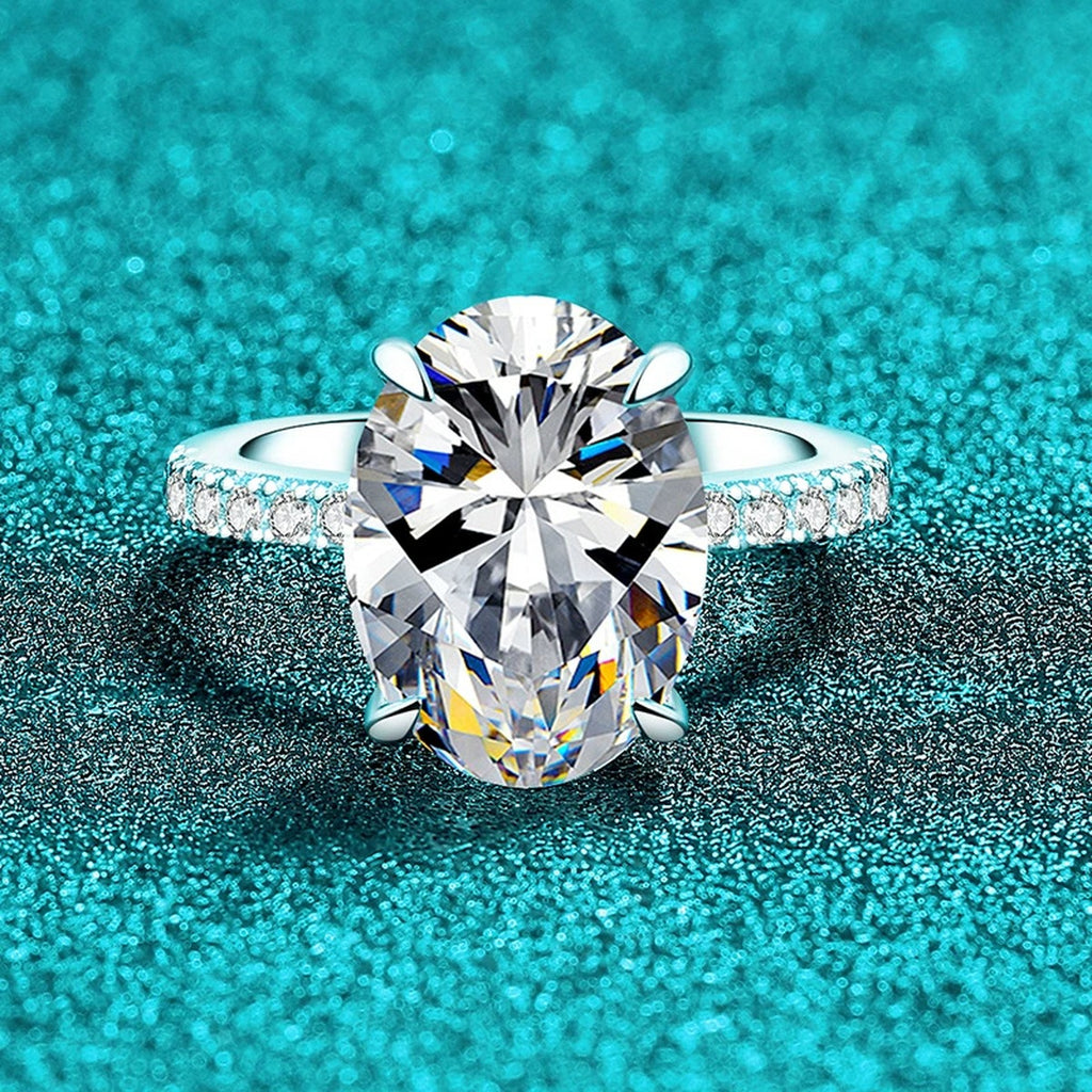 Oval Moissanite Engagement Ring with CZ product view showing moissanite setting and metal finish