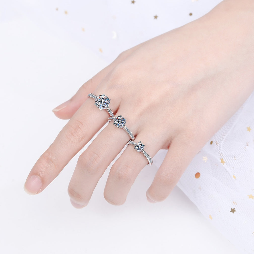 Round Moissanite Side Stone Adjustable Ring with CZ worn on hand to show scale, band width, and ring profile