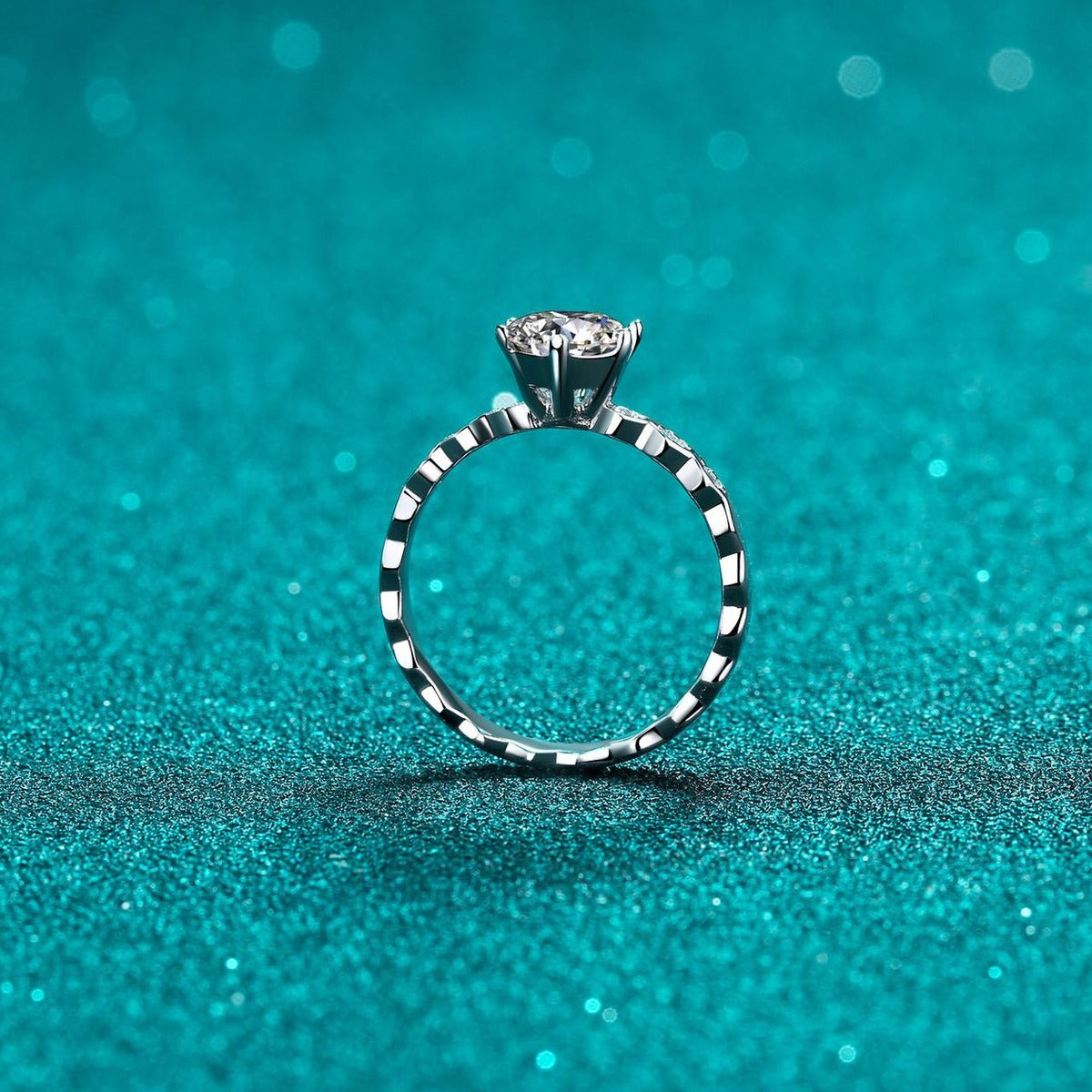 Round Moissanite Side Stone Ring with CZ product view showing moissanite setting and metal finish