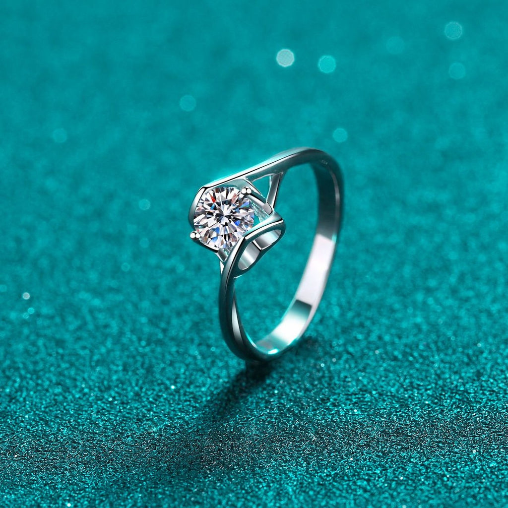 Round Moissanite Split Shank Engagement Ring product view showing moissanite setting and metal finish