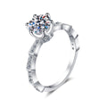 Round Moissanite Side Stone Ring with CZ in rhodium-plated S925 sterling silver on clean white background