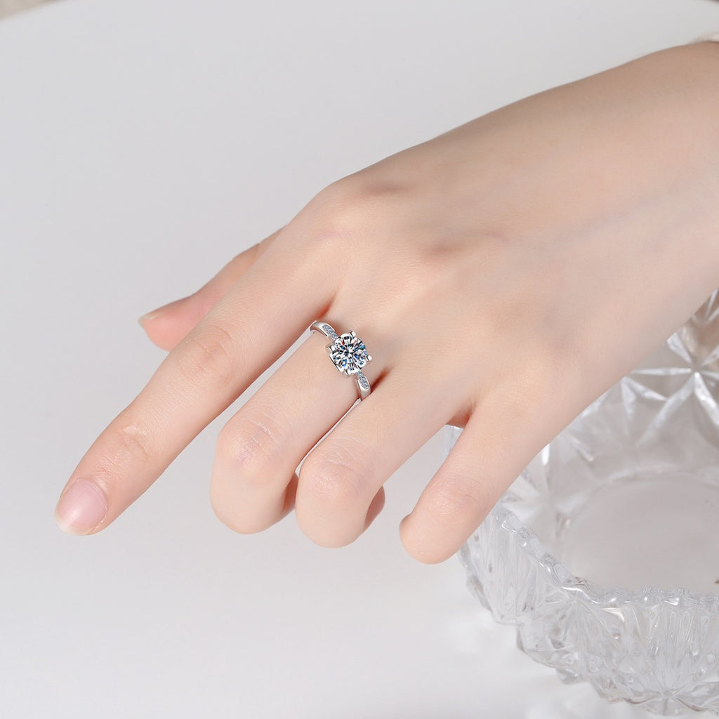Round Moissanite Side Stone Adjustable Ring with CZ worn on hand to show scale, band width, and ring profile