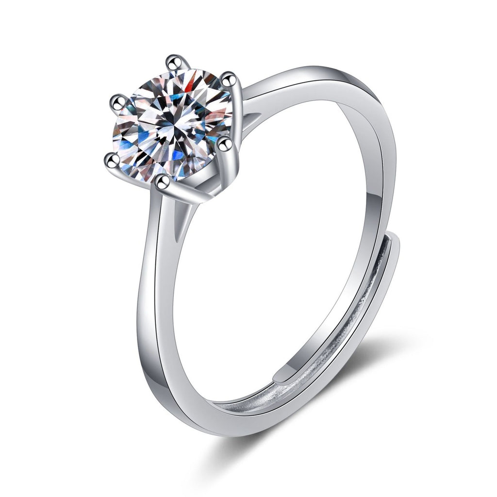 Round Moissanite Solitaire Ring in Rhodium-Plated S925 Sterling Silver clean white background product photo showing the ring silhouette and moissanite setting