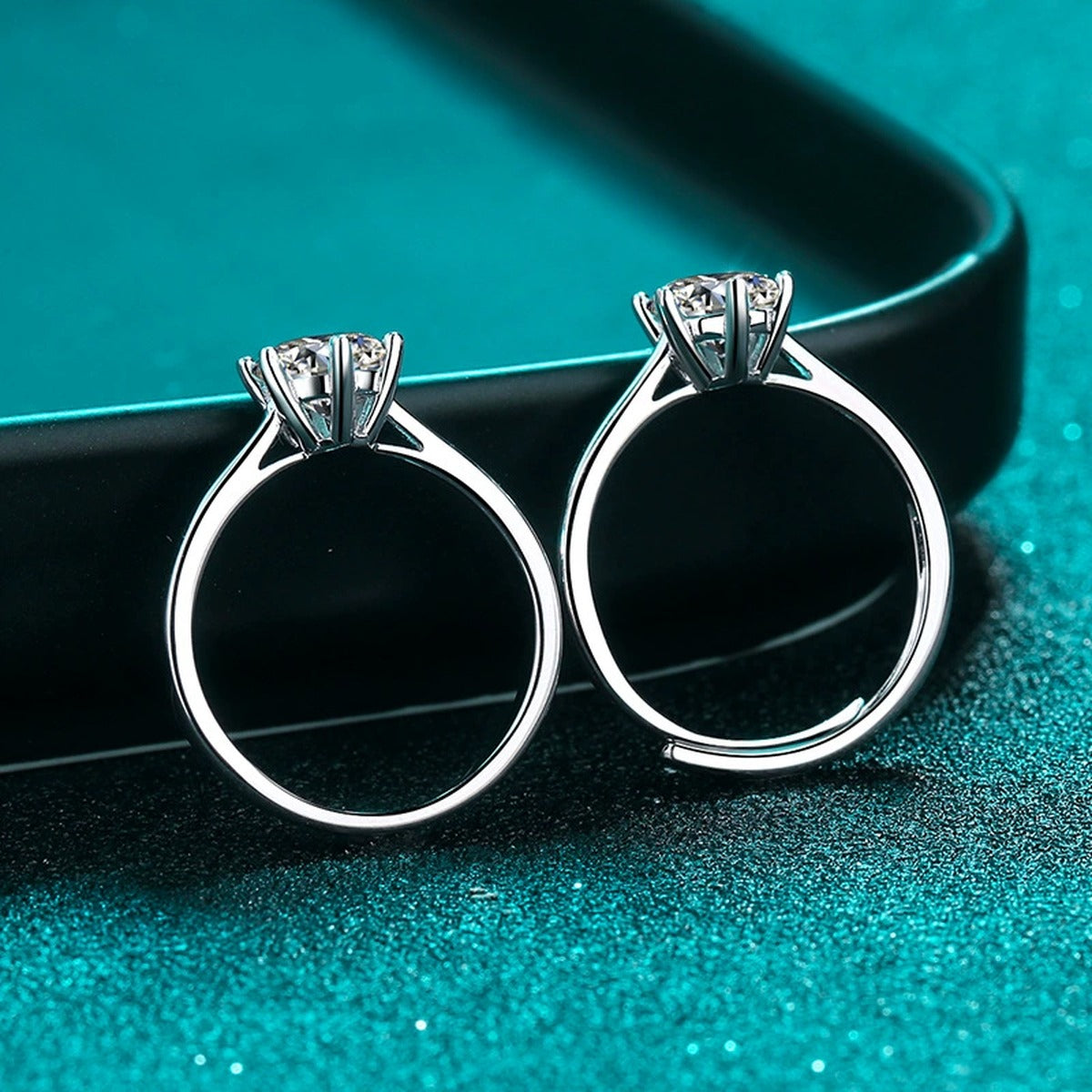 Round Moissanite Solitaire Ring in Rhodium-Plated S925 Sterling Silver blue display product photo showing the moissanite setting and band profile