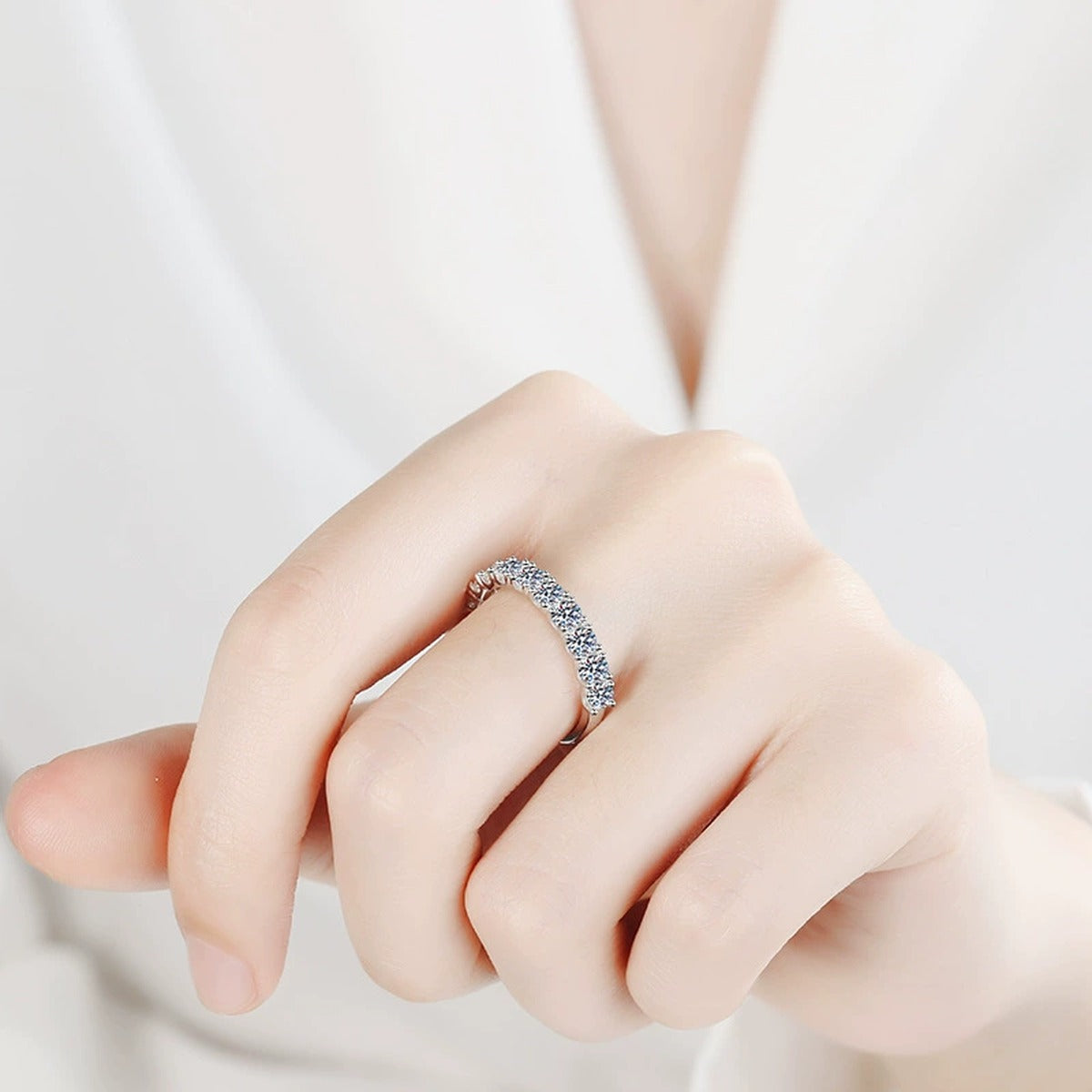 Pave Moissanite Band Ring in Rhodium-Plated S925 Sterling Silver worn on hand, showing scale, finger coverage, and rhodium-plated finish