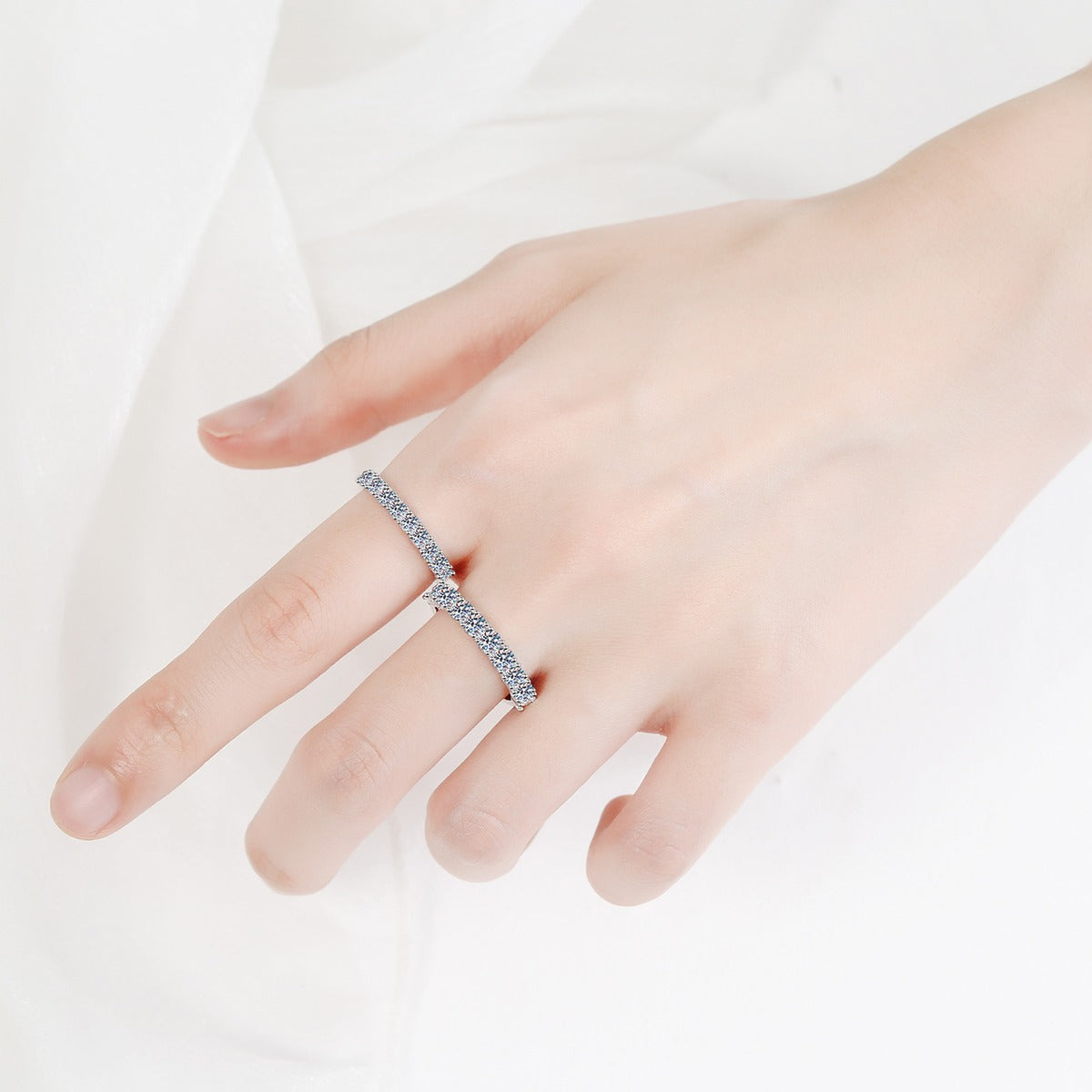 Pave Moissanite Band Ring in Rhodium-Plated S925 Sterling Silver studio product angle showing the ring setting, stone detail, and band design