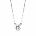 Bezel Solitaire Moissanite Necklace in Rhodium-Plated S925 sterling silver on white background showing pendant shape and round moissanite
