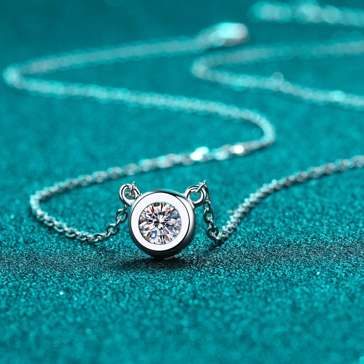 Bezel Solitaire Moissanite Necklace in Rhodium-Plated S925 sterling silver product scene view showing chain and setting detail