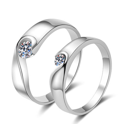 Round Moissanite Couples Ring Set in rhodium-plated S925 sterling silver on clean white background