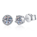Round Moissanite Stud Earrings in Rhodium-Plated S925 Sterling Silver white background product photo showing the pair, four-prong setting, and push-back posts
