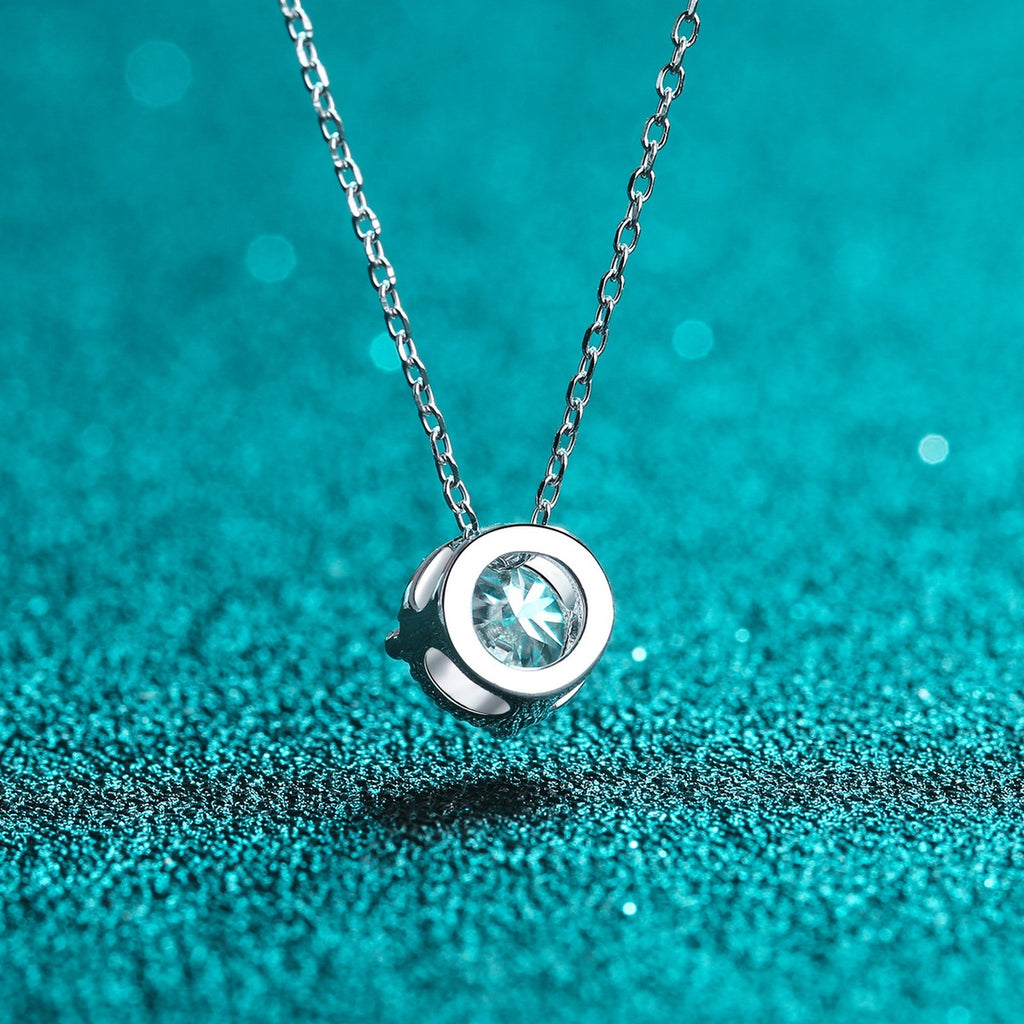 Solitaire Moissanite Pendant Necklace in Rhodium-Plated S925 sterling silver product scene view showing chain and setting detail