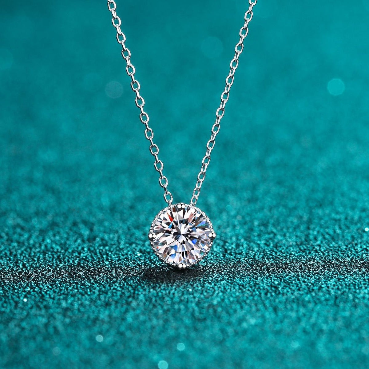 Solitaire Moissanite Pendant Necklace in Rhodium-Plated S925 sterling silver product scene view showing angled sparkle