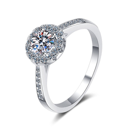 Round Halo Moissanite Ring with CZ in Rhodium-Plated S925 Sterling Silver clean white background product photo showing the ring silhouette and moissanite setting